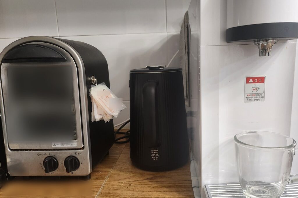 adhd medication myths — my daily medication pouches hanging beside the electric kettle where I see them every single day